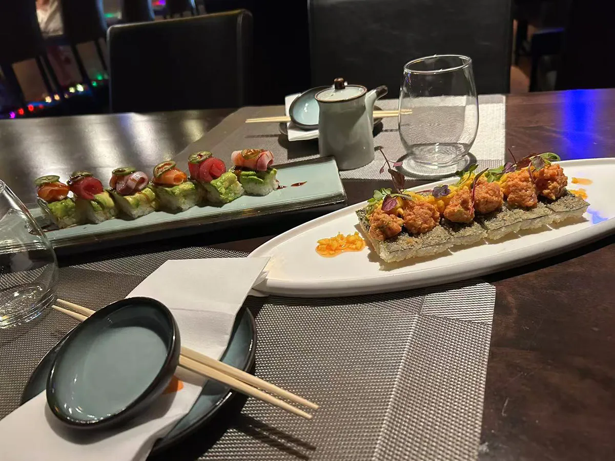 Assorted sushi rolls and crispy rice bites at Sushi Empire, a Japanese Restaurant in New Haven