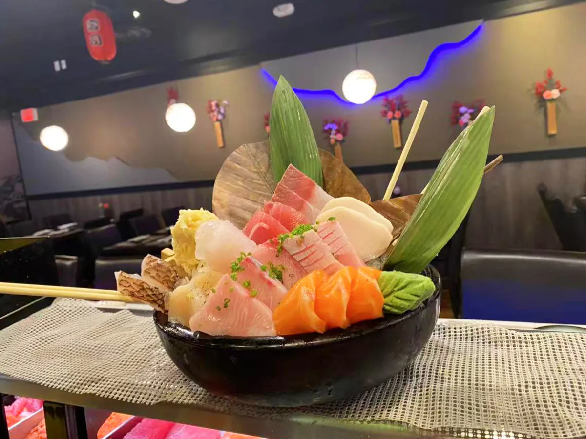 Fresh sashimi bowl with salmon tuna and scallops at Sushi Empire, a Japanese Restaurant in New Haven